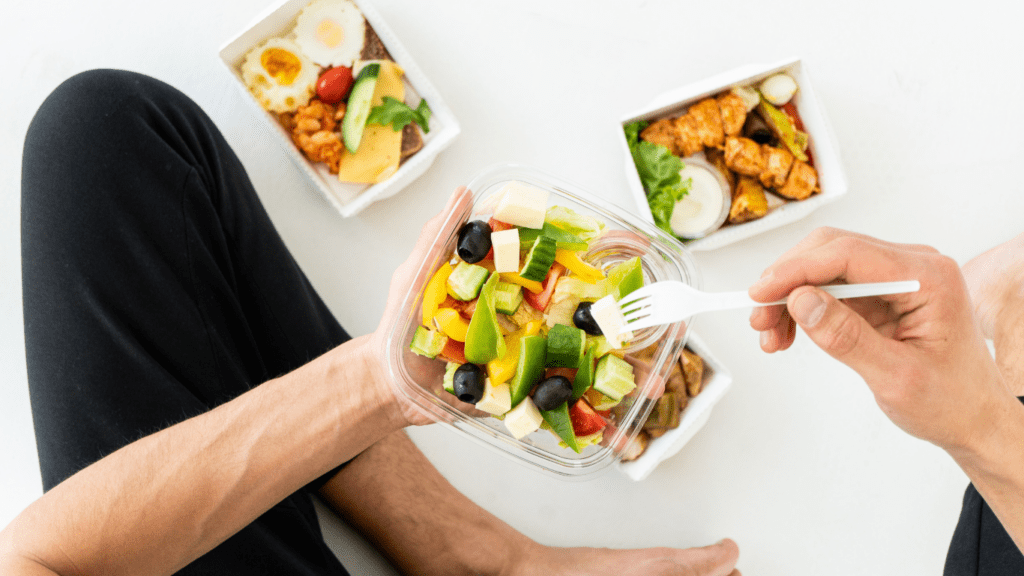 A person eating a salad