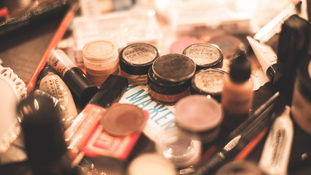 an assortment of makeup products on a table