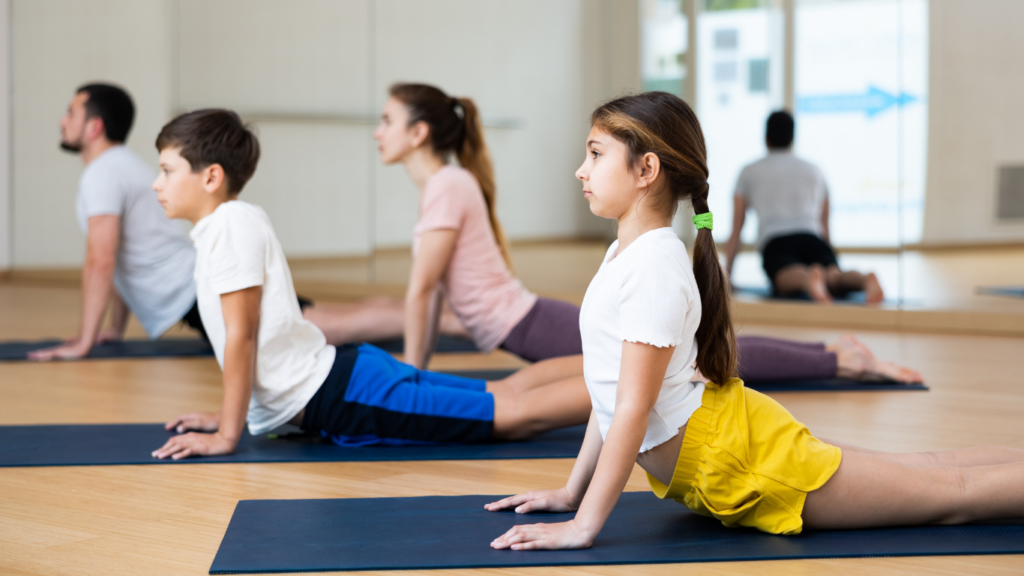 a group of people doing yoga