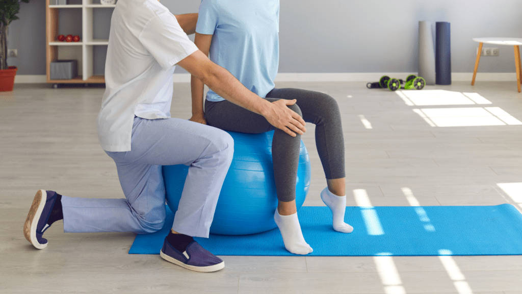 a person getting their leg examined by a doctor