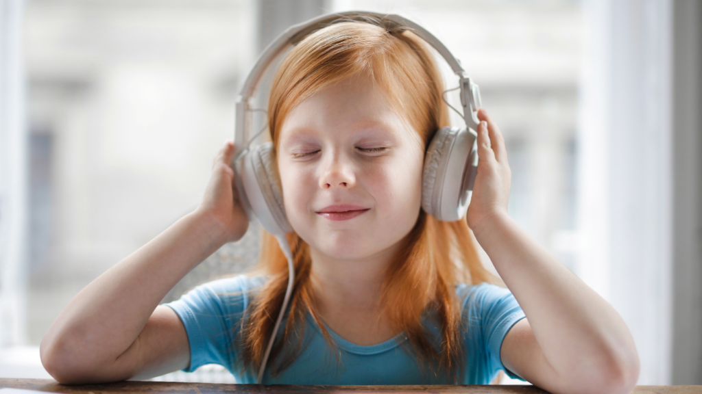 a person listening to music with headphones